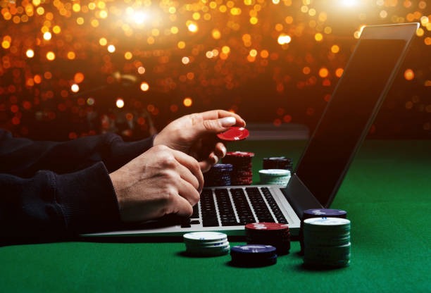 Mobile phone displaying Caribbean Stud Poker betting interface